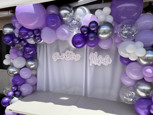 Backdrop with Drapes and Balloon Garland